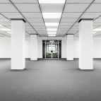 an image of an empty office space with a recently refurbished suspended ceiling