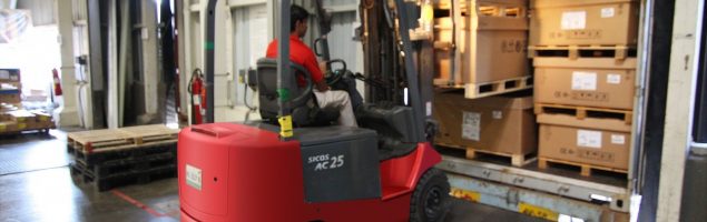 an image of a forklift being used in an industrial relocation